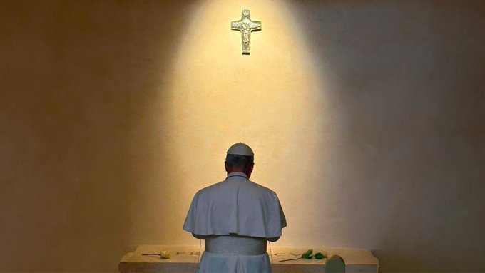 Pope Leo XIV prays at the tomb of his predecessor Pope Francis.